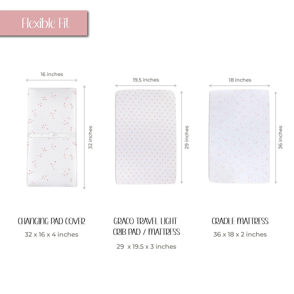 Ely's & Co cradle sheet in mauve pink stars keeping the sleep surface clean and cozy.