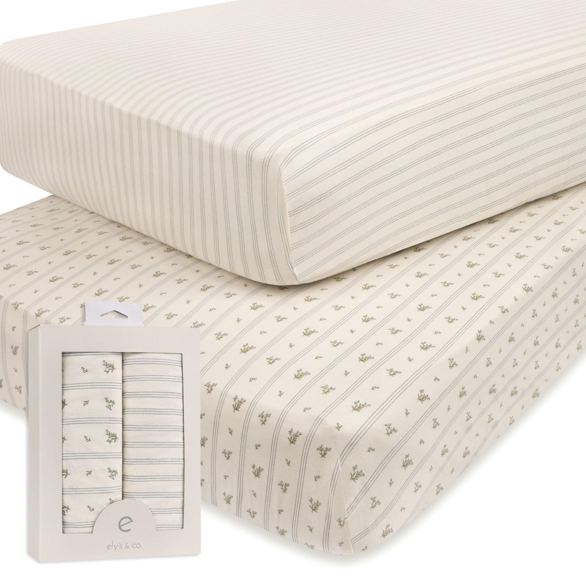 Ely's & Co. blue linear berry leaf crib sheets offer a snug fit for standard cribs.