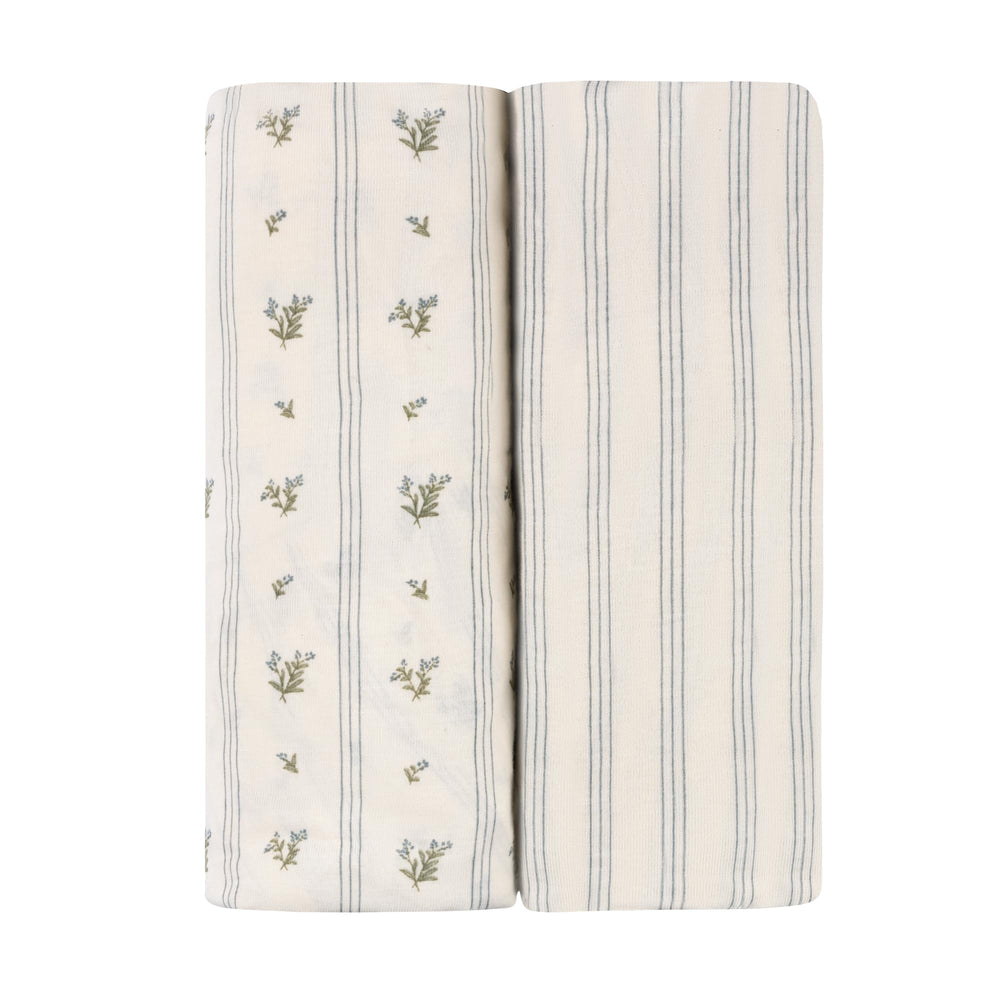 Ely's & Co. blue-white celestial print adds subtle nursery style.