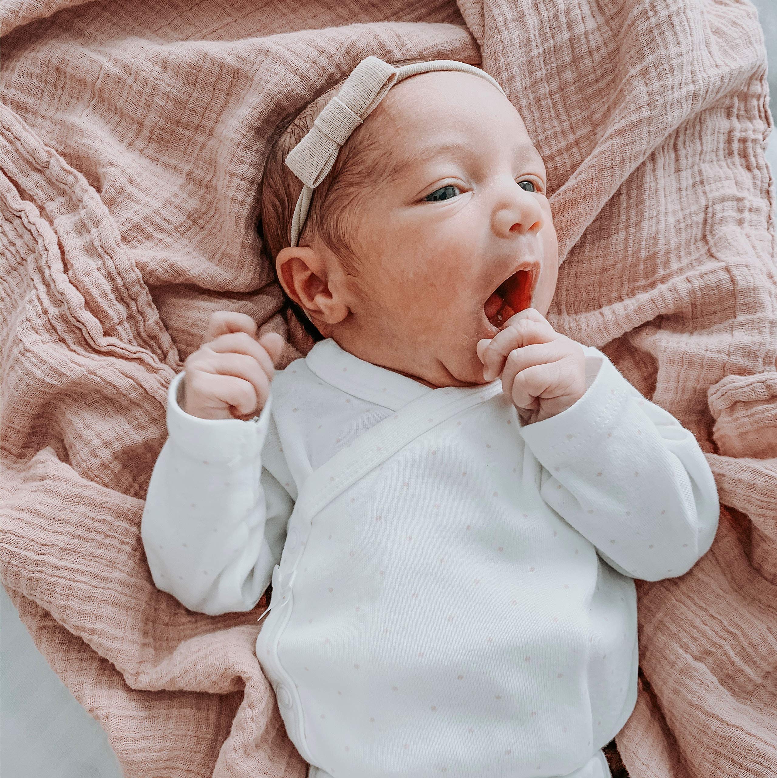 Ely's & Co. cotton muslin swaddle is machine washable and softens with each wash.