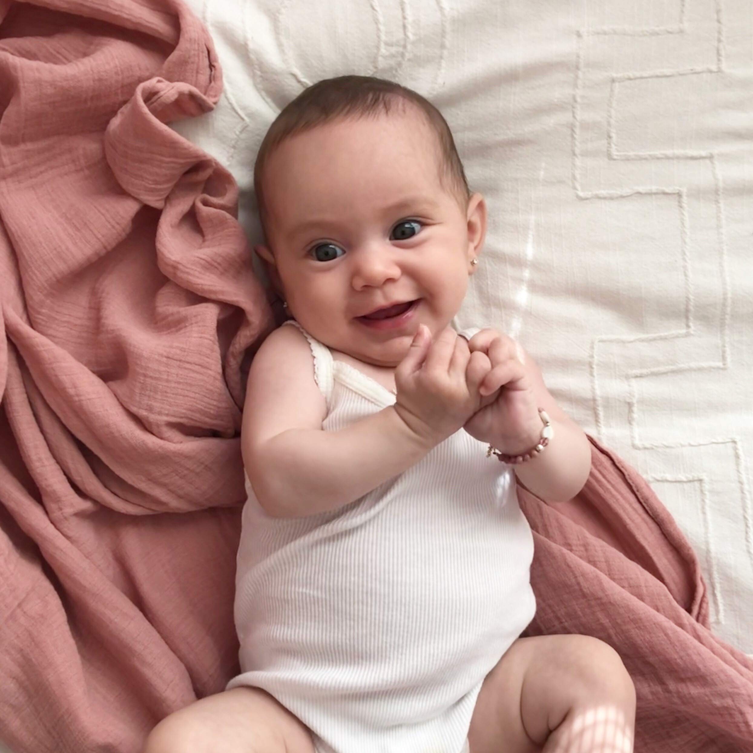 Ely's & Co. swaddle doubles as nursing cover for privacy.