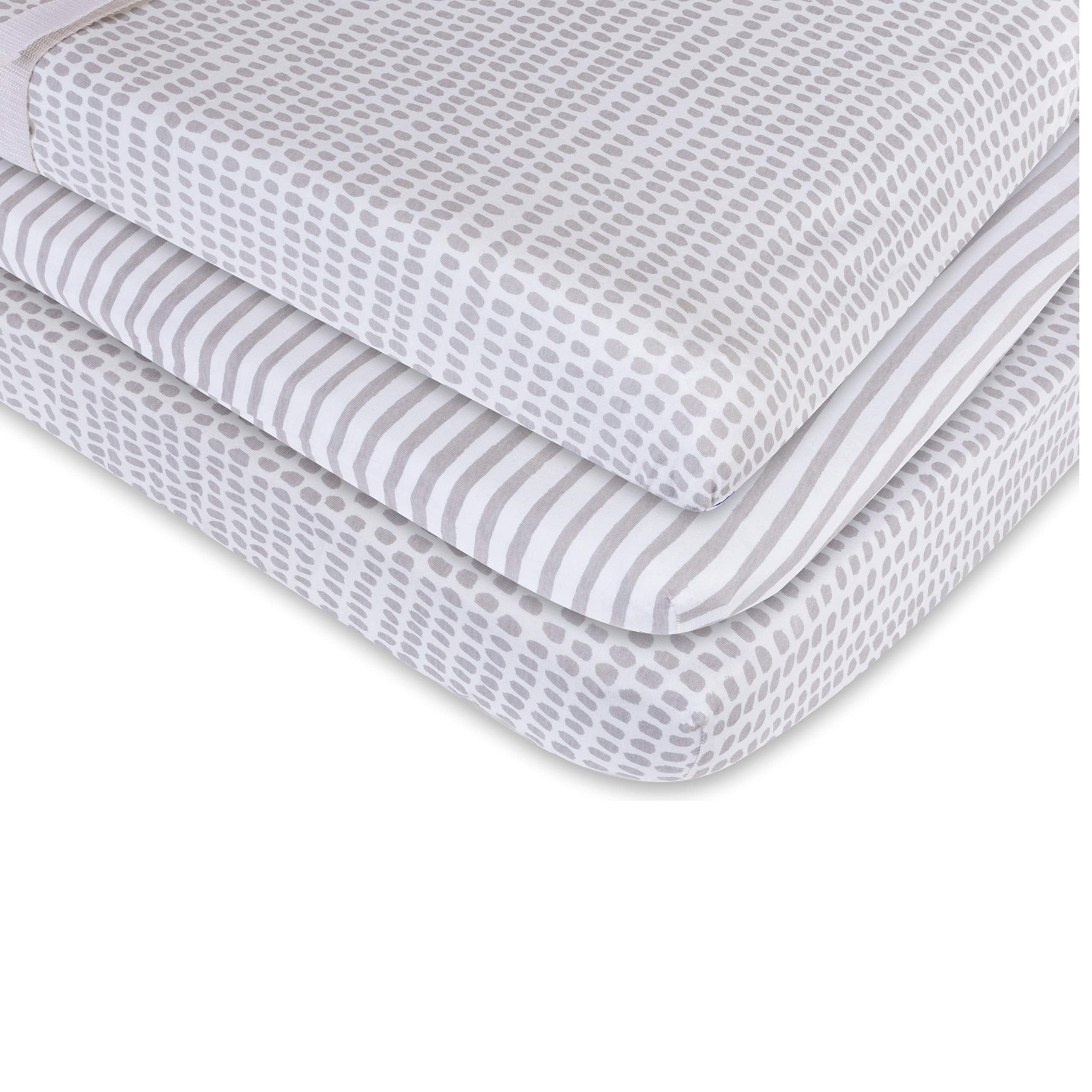 Flexible elastic-band fit keeps the cover snug on changing pads and cradle mattresses.