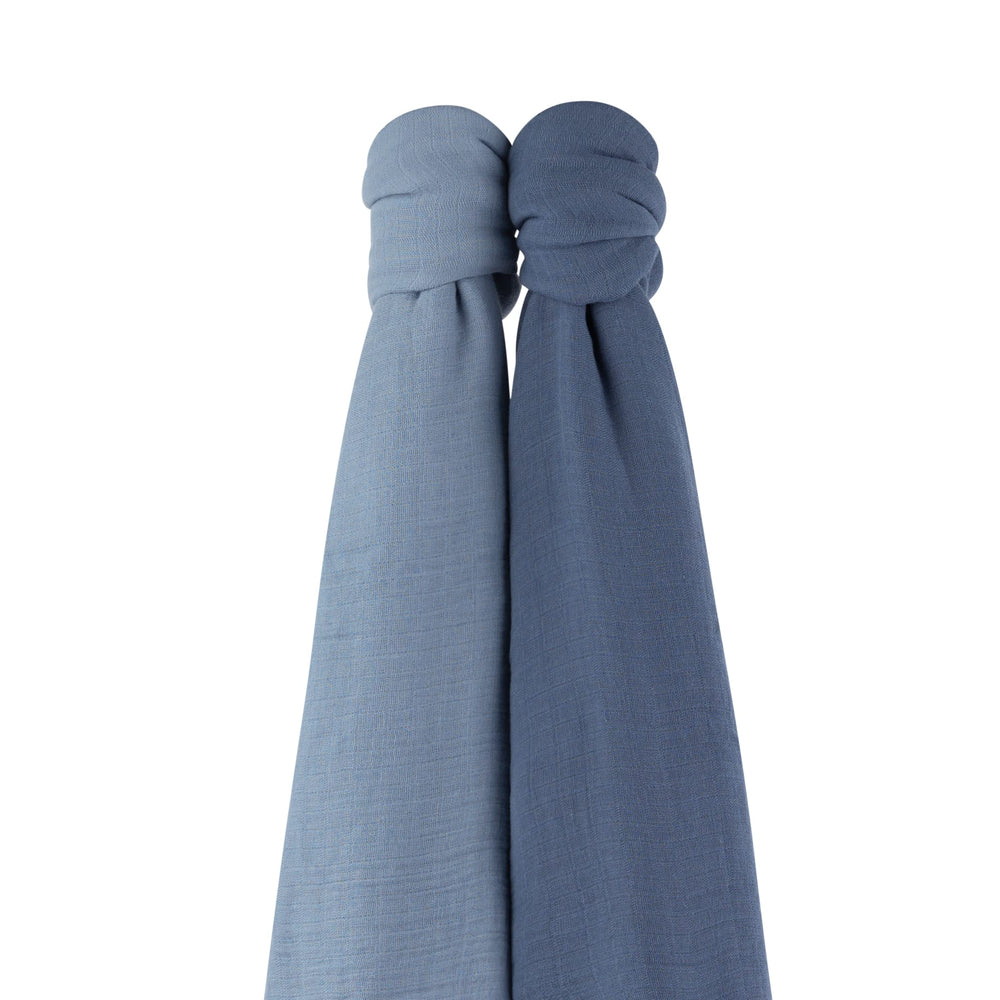 Gift-ready packaging featuring the Indigo blue swaddle set for a baby shower.