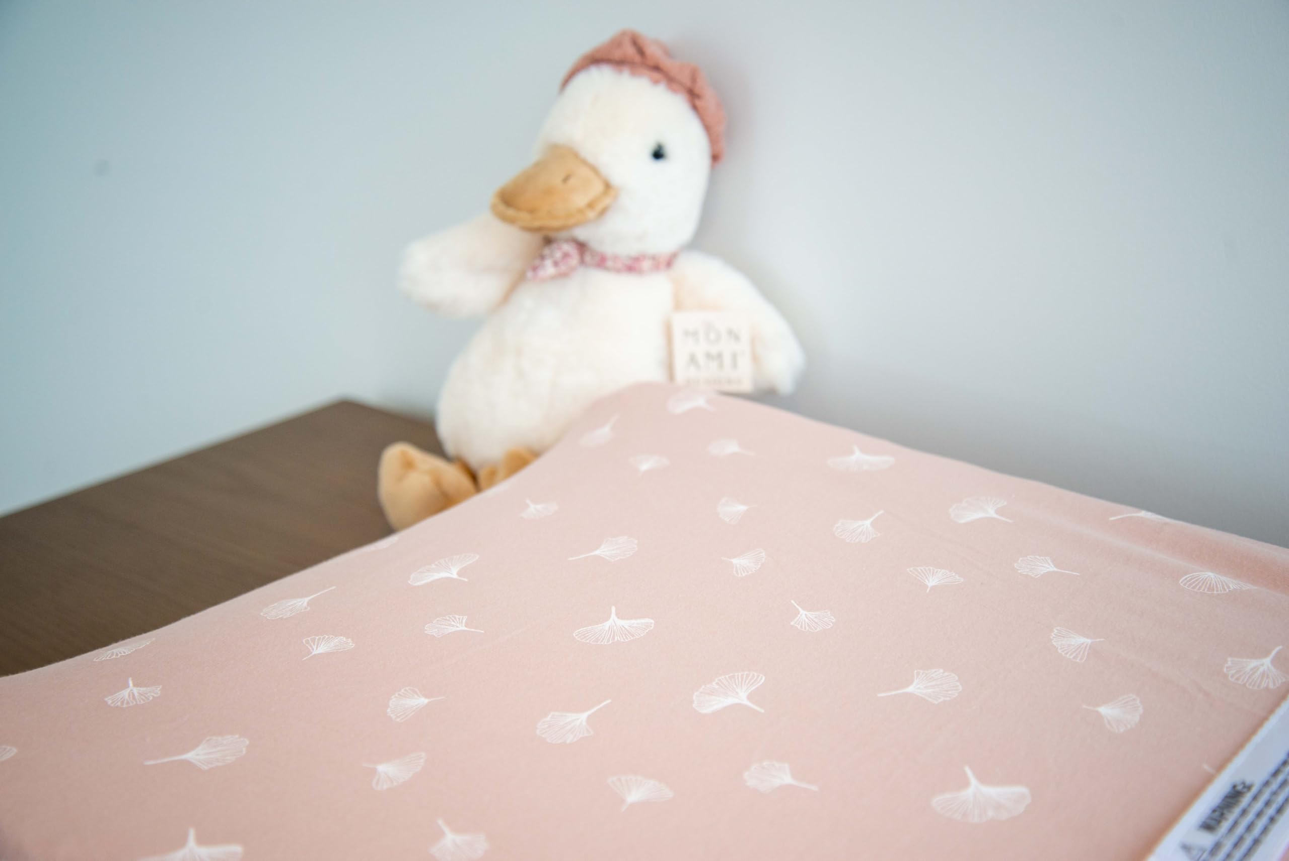 Ely's & Co. jersey knit cotton changing pad cover offers soft, breathable comfort.