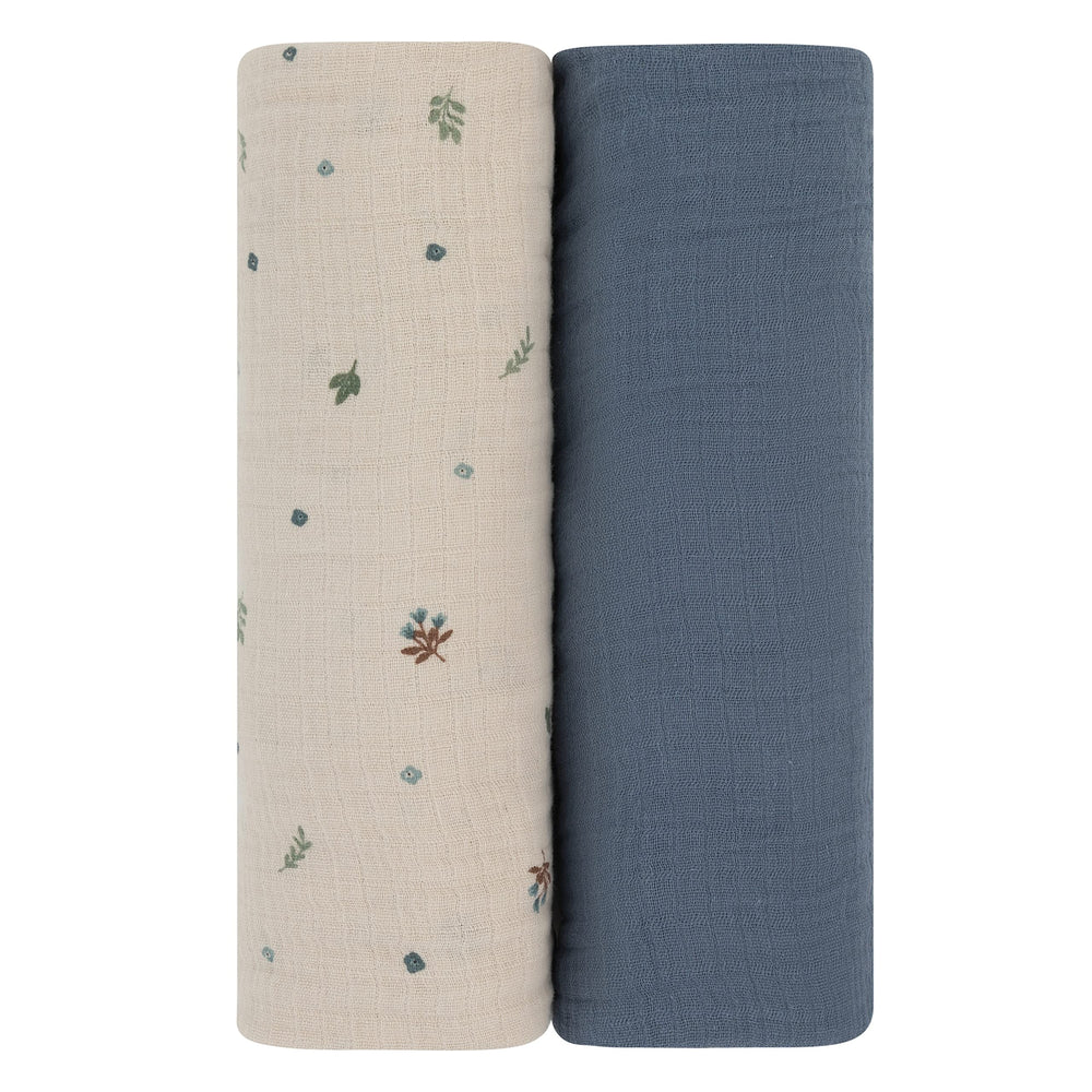 Ely's & Co swaddle used as burp cloth with soft fabric.