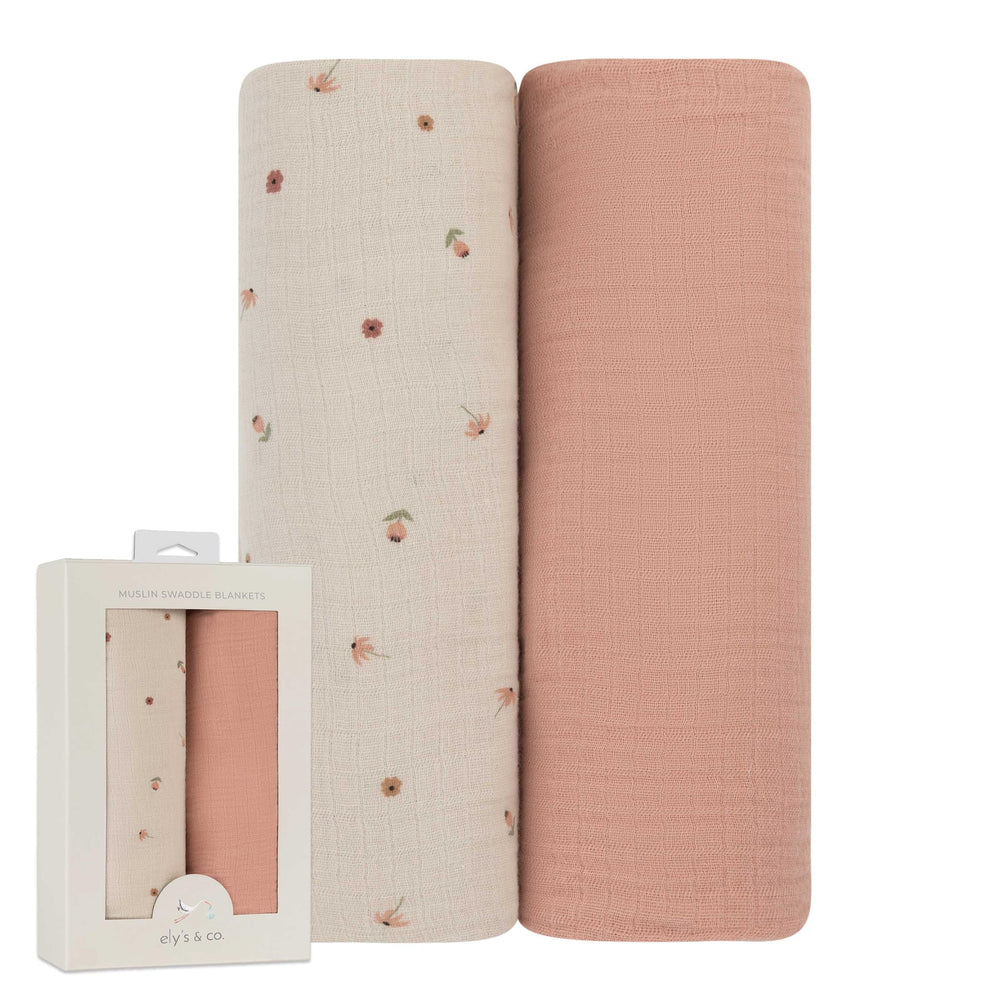 Ely's & Co. muslin swaddle pink garden flower print for gentle baby comfort.
