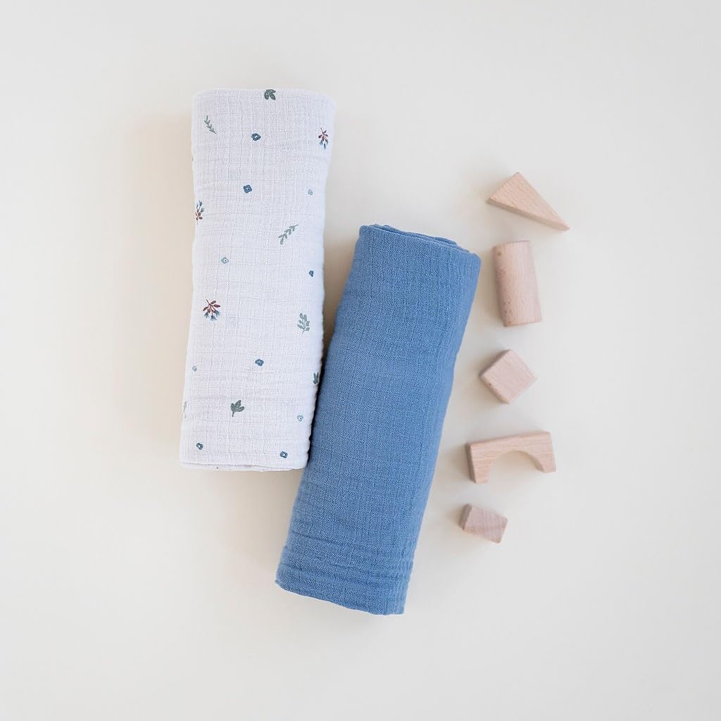 Ely's & Co swaddle used as playtime blanket for baby.