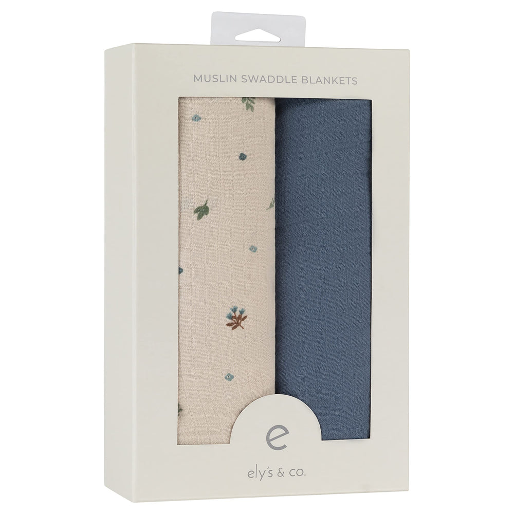 Ely's & Co printed blue garden flower swaddle for stylish comfort.