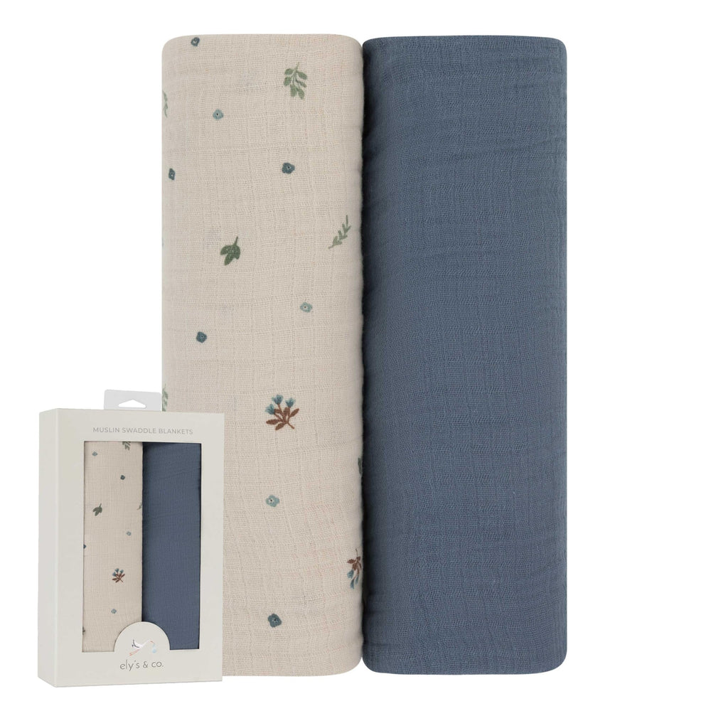 Ely's & Co solid blue muslin swaddle blanket, breathable and cozy.