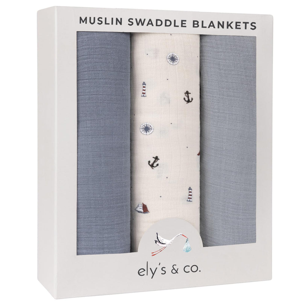 Ely's & Co. muslin swaddle blankets in nautical blue and ivory, breathable baby comfort.