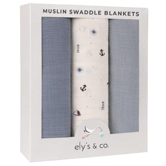 Ely's & Co. muslin swaddle blankets in nautical blue and ivory, breathable baby comfort.