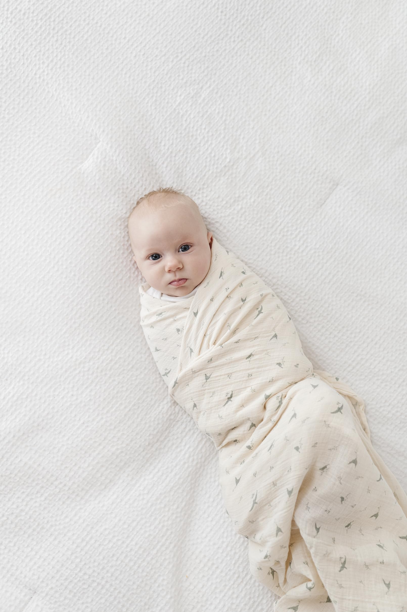 Ely's & Co sage bird nursing cover swaddle provides discreet coverage when nursing.