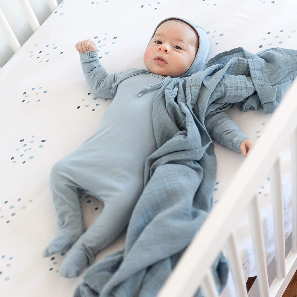 On-the-go use: swaddle doubles as stroller or car seat cover.