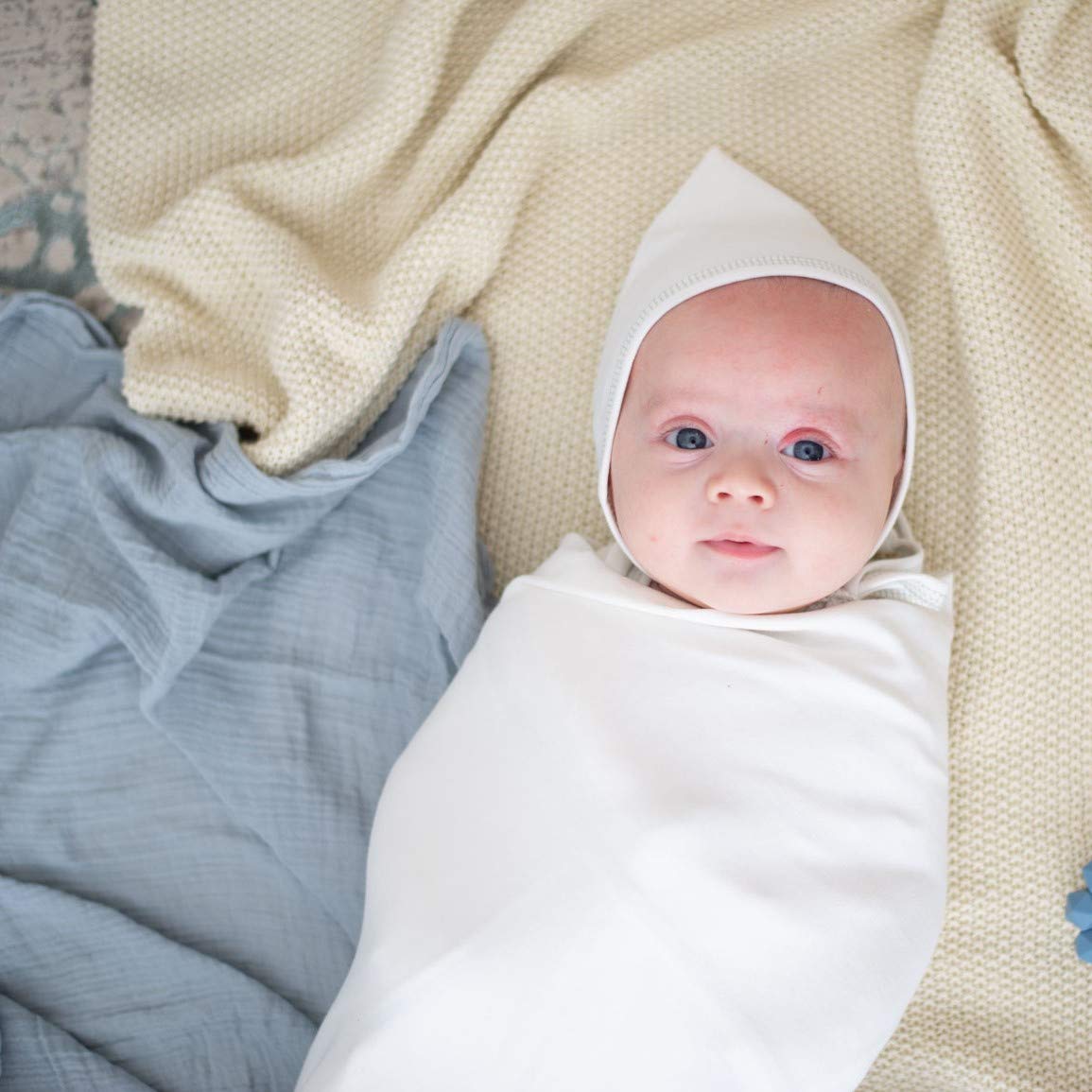 Ely's & Co swaddle used as nursing cover for discreet feeding.