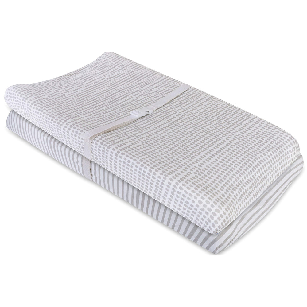 Ely's & Co cradle sheet with waterproof liner protects a cradle mattress.