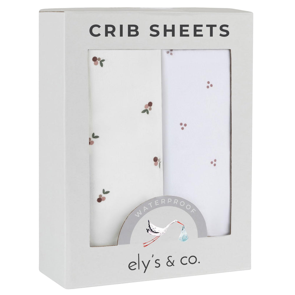 Ely's & Co waterproof crib sheet in berry dot lavender keeps mattress dry and comfy