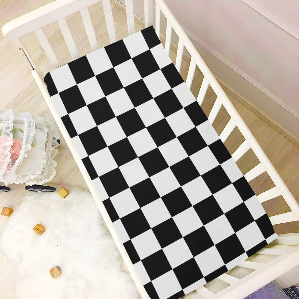Playful checkerboard plaid prints on Emelivor crib sheet for nursery decor