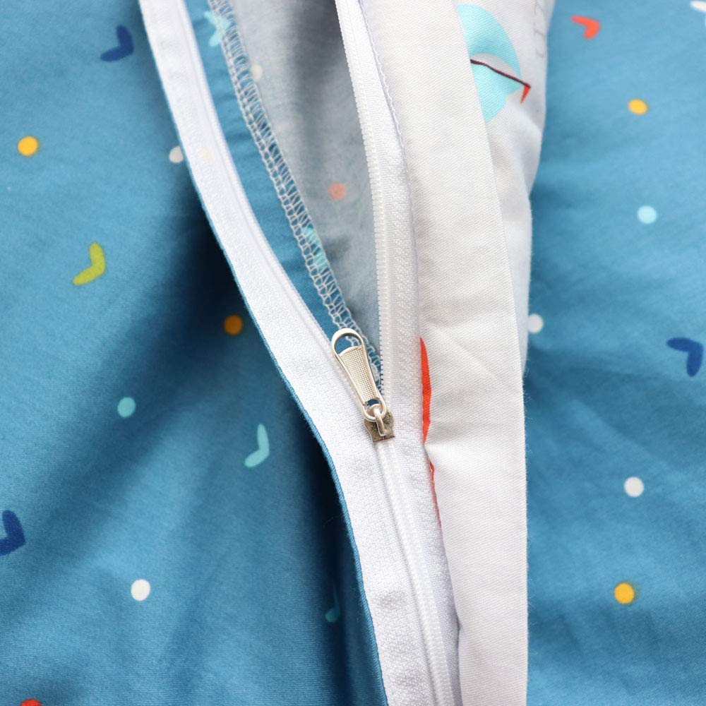 Emenpy nursery patterns in soft shades stimulate baby’s visual interest.