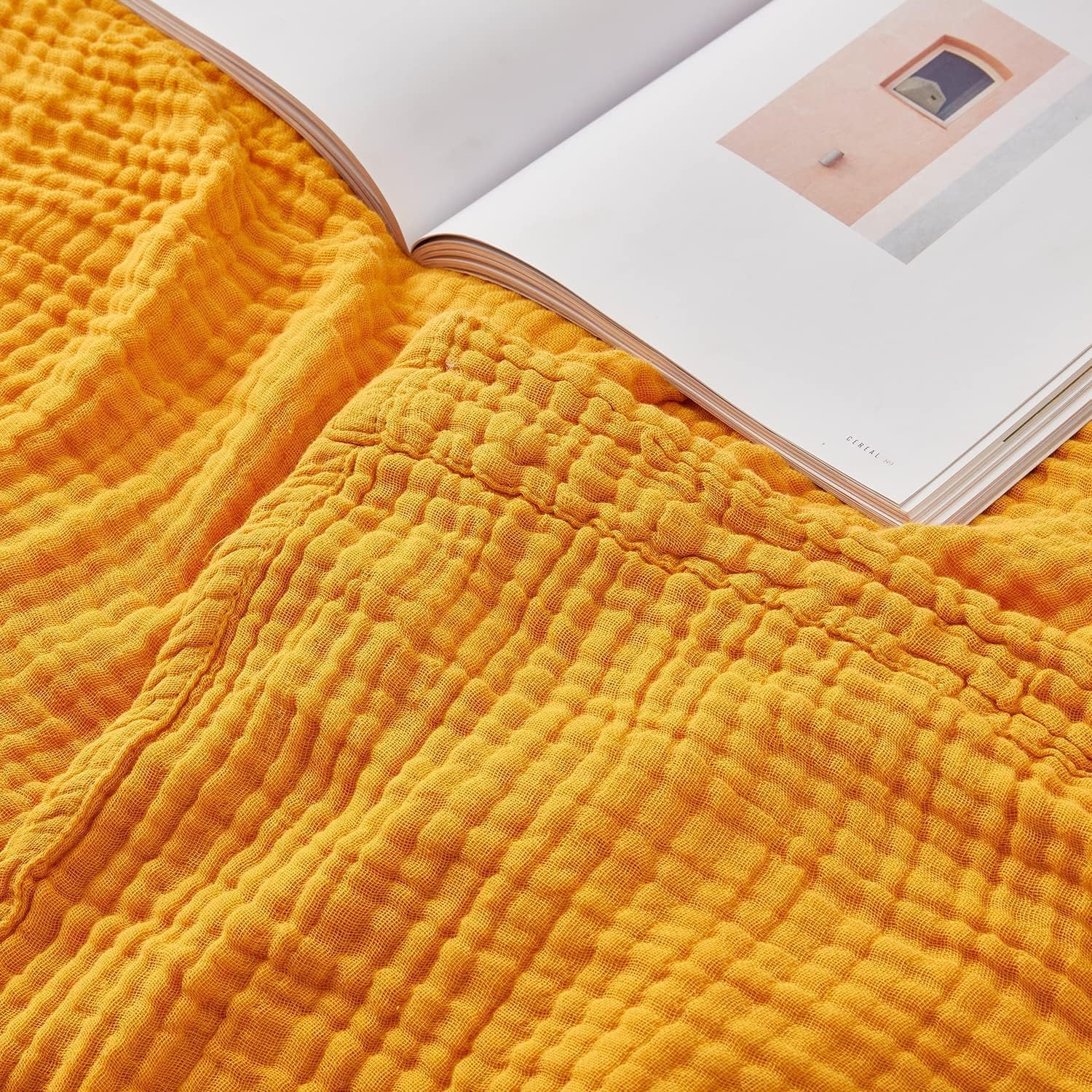 EMME Muslin baby blanket 40x50 inches in mustard yellow for gentle skin comfort.