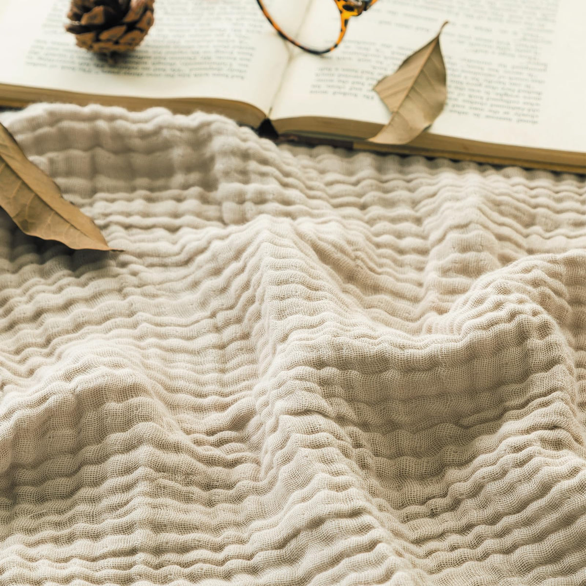 EMME Muslin Baby Blanket shows soft cotton gauze, gentle on baby's skin.