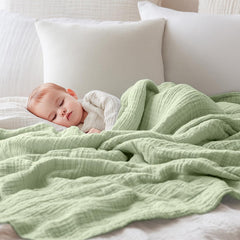 EMME muslin baby blanket stroller cover provides shade and airflow during outings.