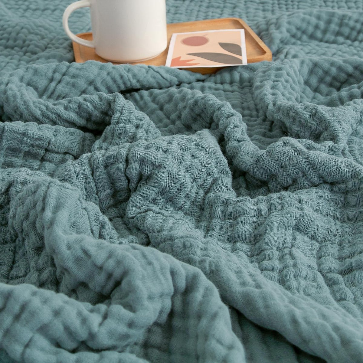 EMME muslin baby blanket teal front view showing soft cotton texture and breathable fabric