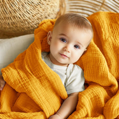 EMME Muslin swaddle blanket 4-layer design for breathable wraps.