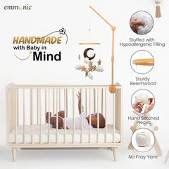 EMMNNIC mobile closeup hangs soft elements that gently engage infant visual tracking.