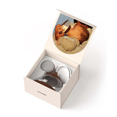 Emulait Anatomy bottle promotes bonding and eye contact during caregiver and baby feeding.