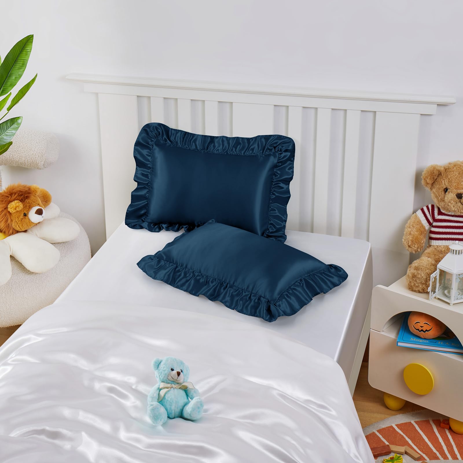 Entisn satin pillowcase adds a calm, coordinated look to nursery bedding.
