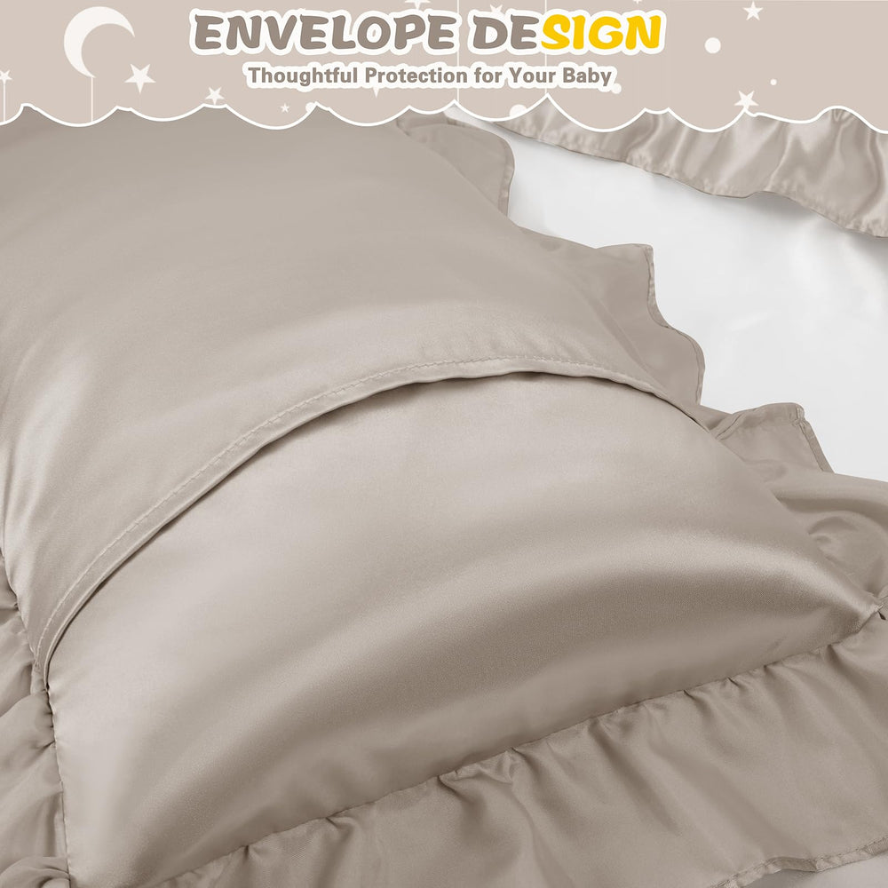 Entisn pillowcase in crib scene emphasizes cozy, secure sleep environment