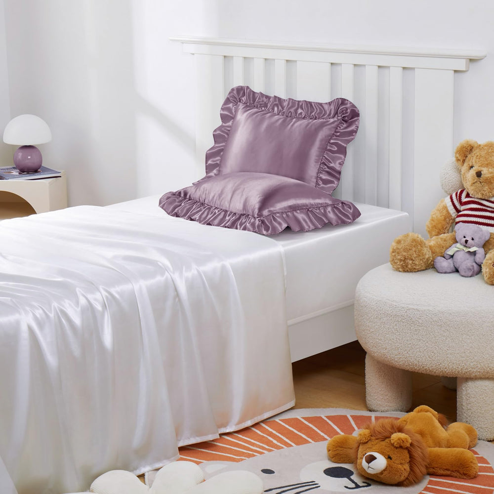 Entisn lavender pillowcase in crib scene promoting calm sleep.