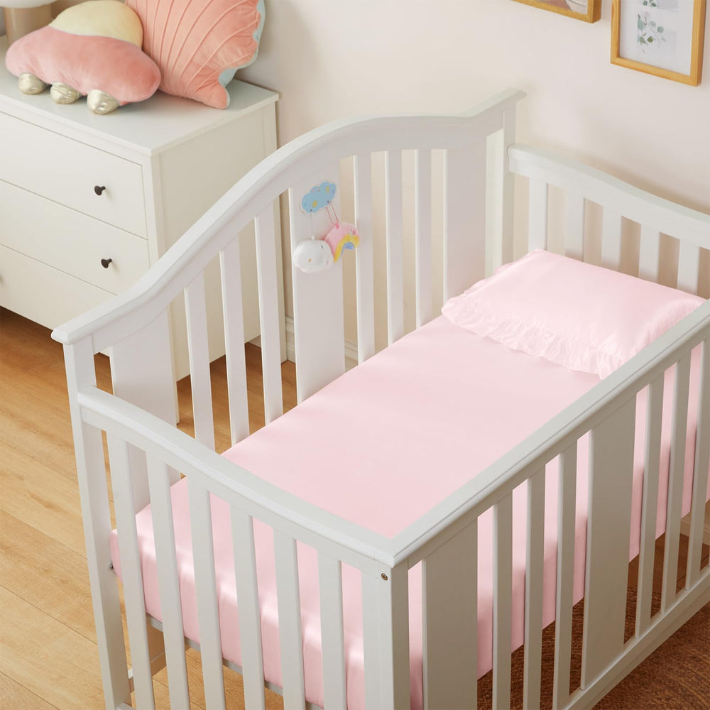 Entisn satin crib sheets offer soft, silk-like texture for gentle skin and hair
