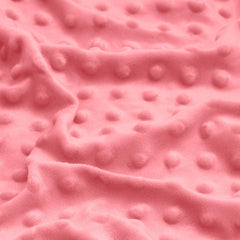 Entisn pink nursery scene showing pillowcase on a crib pillow