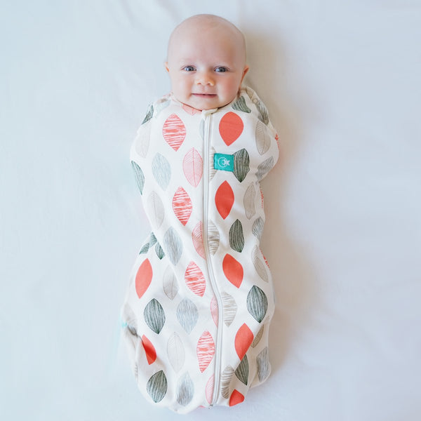ergoPouch Cocoon Swaddle Sack 0.2 tog Blush Leaf close-up: soft organic cotton for newborn comfort.