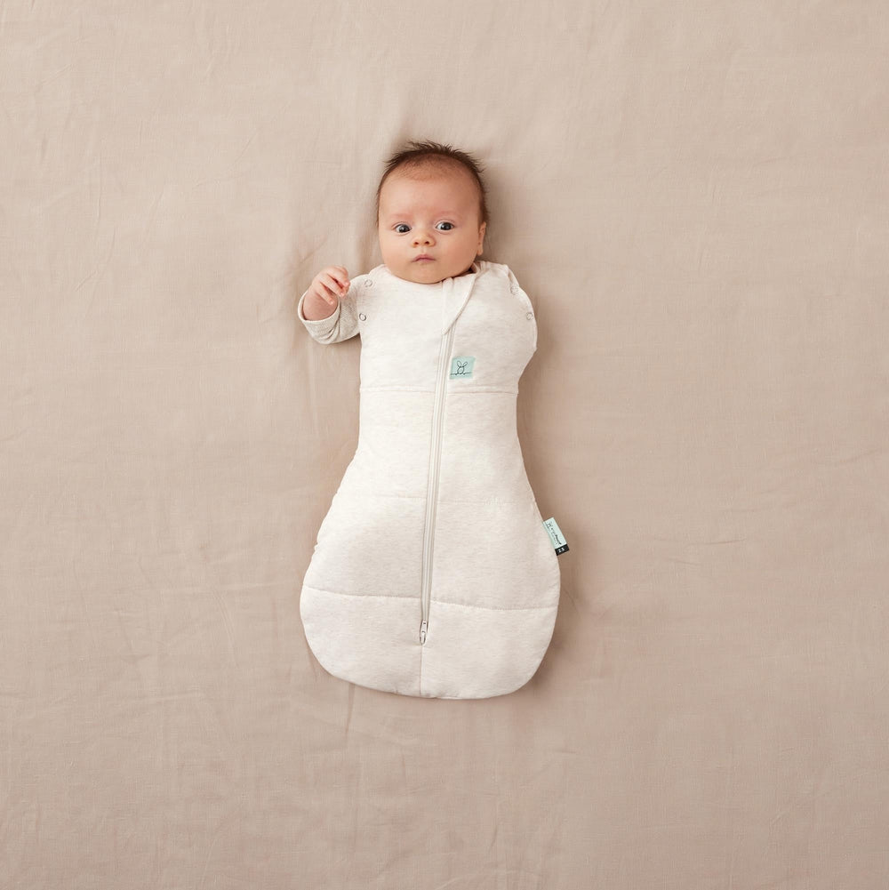 ErgoPouch Cocoon Swaddle Sack uses organic cotton for soft skin.