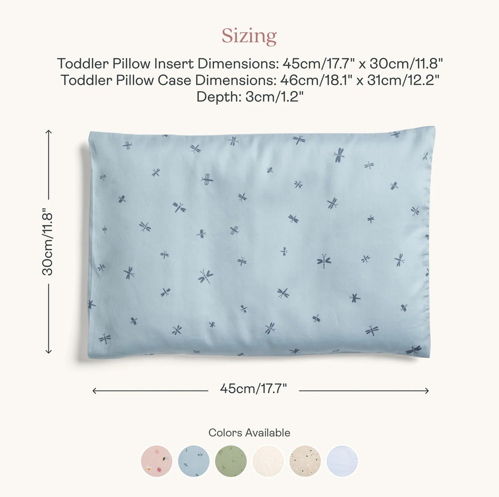 ErgoPouch Dragonflies pillow in use in toddler bed supporting gentle neck alignment