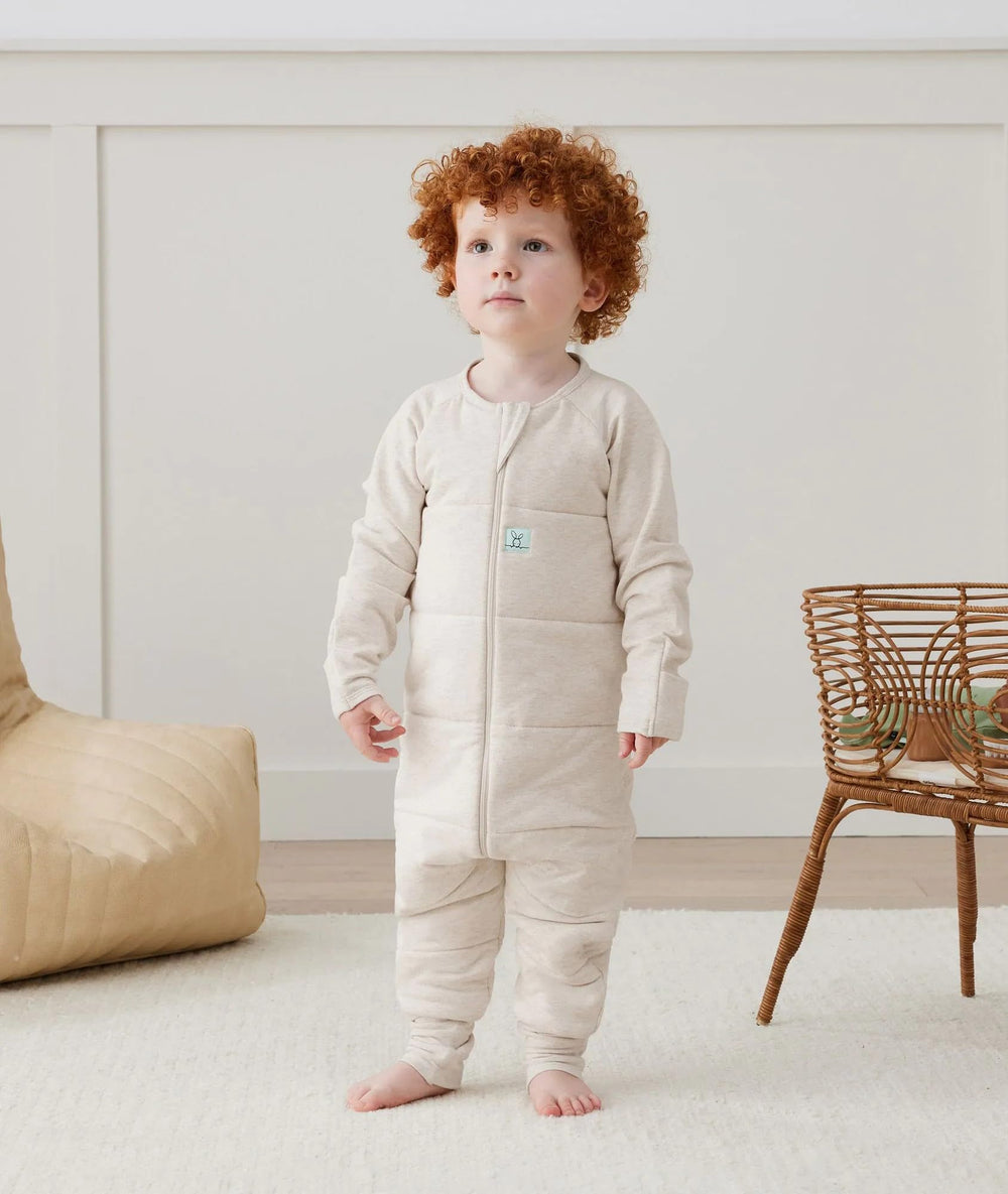 ErgoPouch Sleep Onesie highlights leg mobility during sleep.