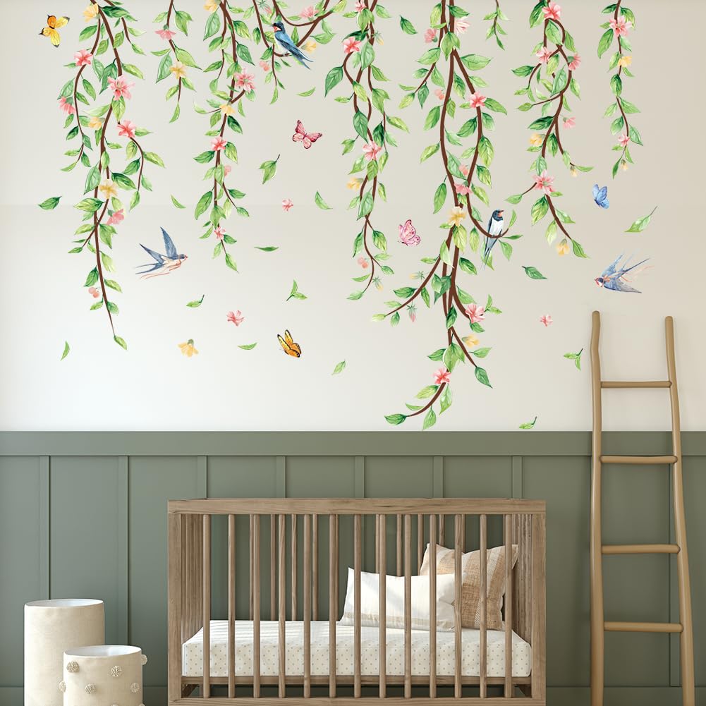 Erllsino reusable vinyl leaves demonstrate easy repositioning on a living room wall.