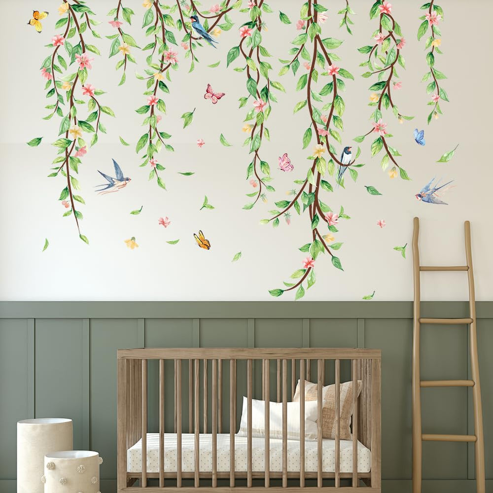 Erllsino reusable vinyl leaves demonstrate easy repositioning on a living room wall.