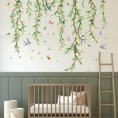 Erllsino reusable vinyl leaves demonstrate easy repositioning on a living room wall.
