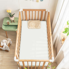 Ersmak satin crib sheet showing elastic bottom for a snug, secure fit