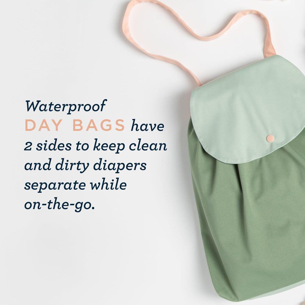 Esembly Day Bag back pocket for easy access to clean items during outings.