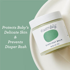 Esembly Everyday Balm ready for cloth diaper-safe application near the diaper area.