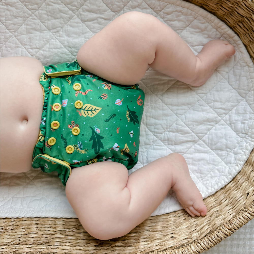 Esembly outer doubles as a reusable swim diaper for pool days.