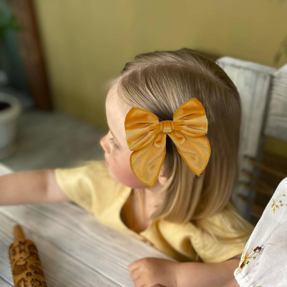 Esumun Velvet Swallowtail Bow colorways for versatile styling