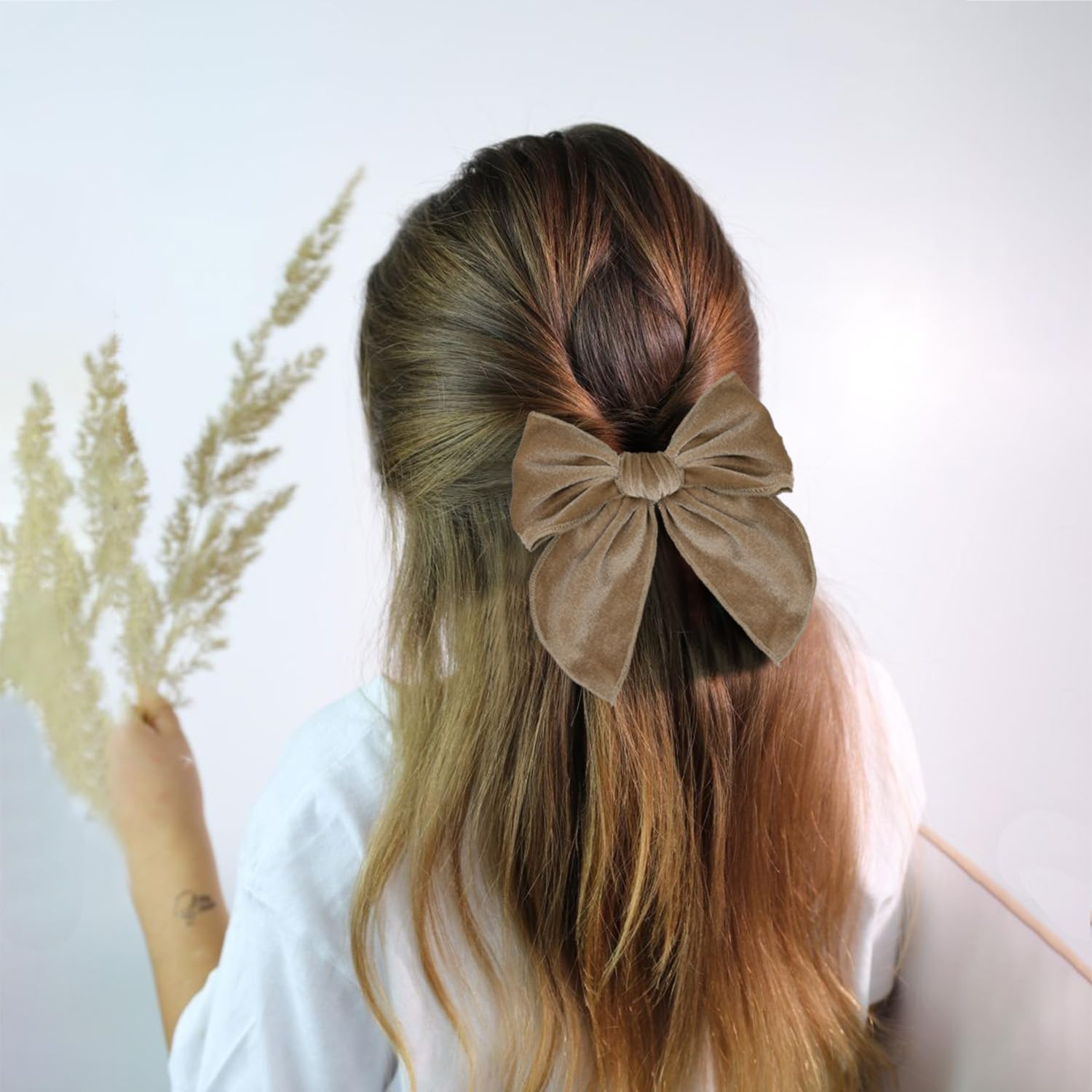 Esumun Velvet Swallowtail Bow worn by toddler for party or school