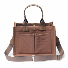 ESVAN tote bag in canvas with front pocket, ideal for quick access essentials.