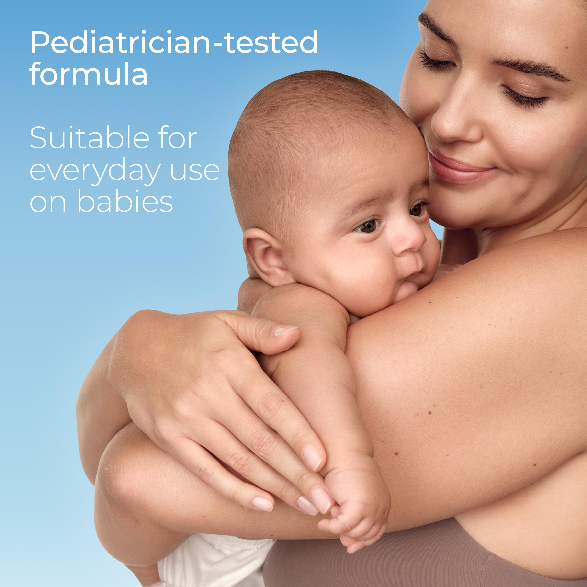 Applying Eucerin Sun Sensitive Mineral Baby Sunscreen SPF 50 to a baby's arm for even coverage