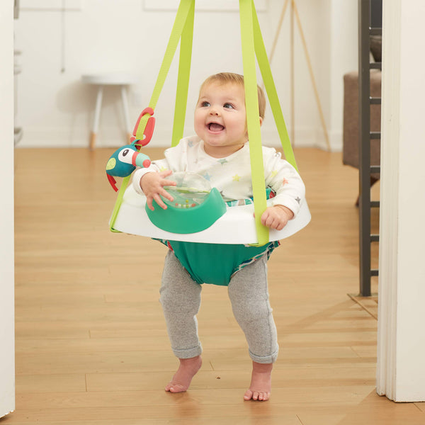 Evenflo Exersaucer Tiny Tropics seat supports early sitting with engaging toys.